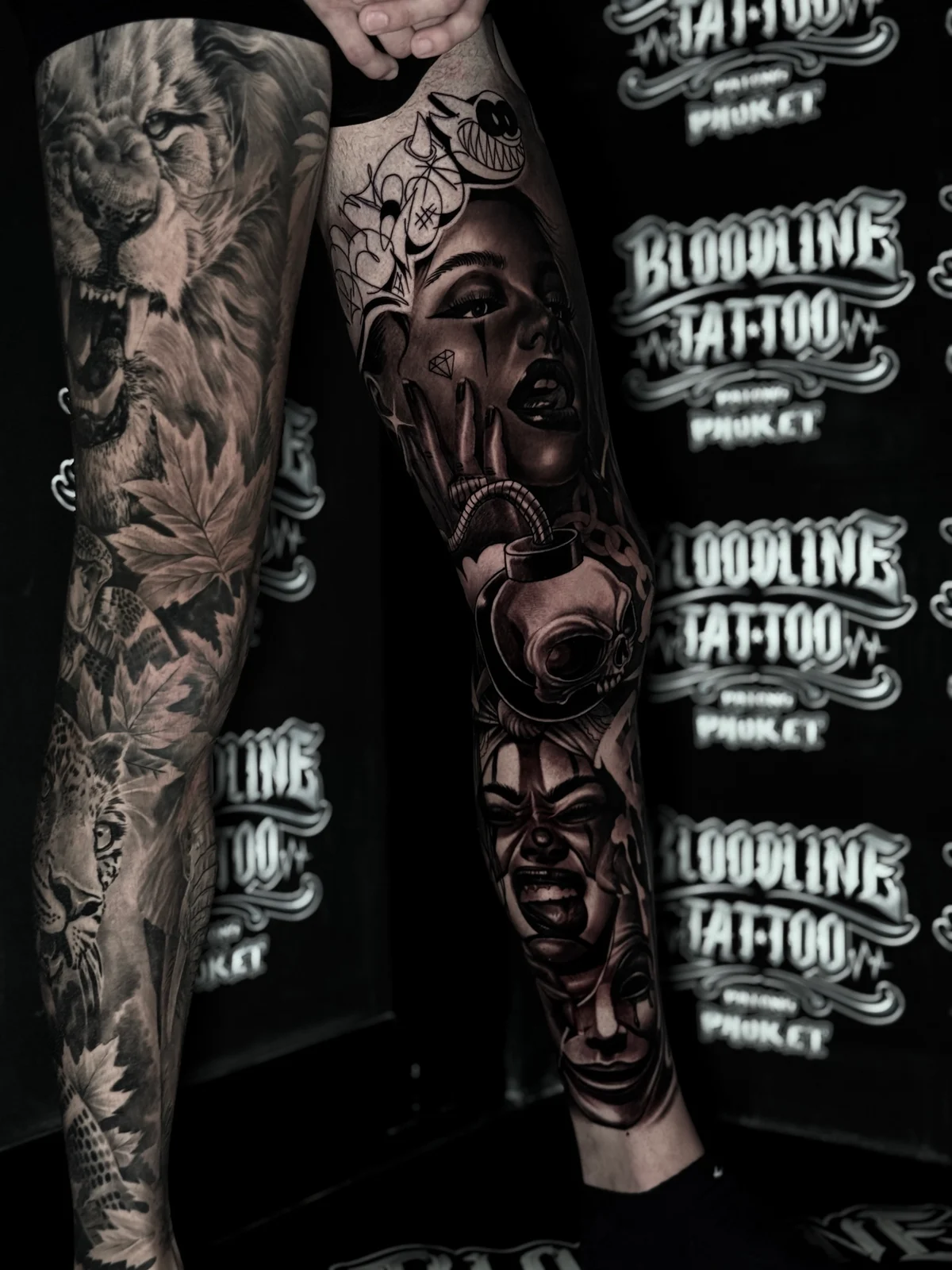 Chicano payasa leg sleeve with skull bomb, screaming portrait, and clown masks at Bloodline Tattoo Phuket.